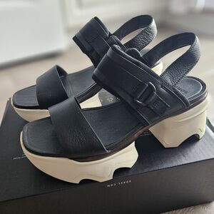 Sorel Kinetic Impact Slingback Black and White Platform Sandals